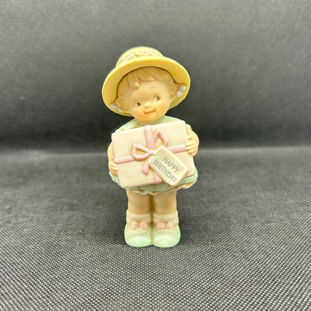 Memories of Yesterday Birthday Girl holding present figurine